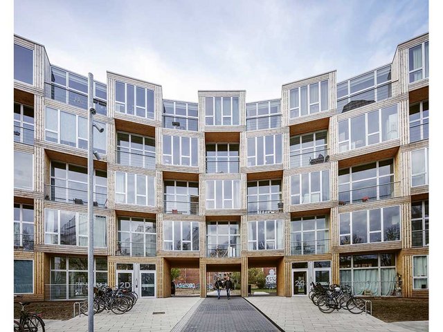 Dortheavej Residence in Kopenhagen: Das dänische Büro BIG (Bjarke Ingels Group) realisierte einen ausdrucksstarken Modulbau mit 66 günstigen Wohnungen. 