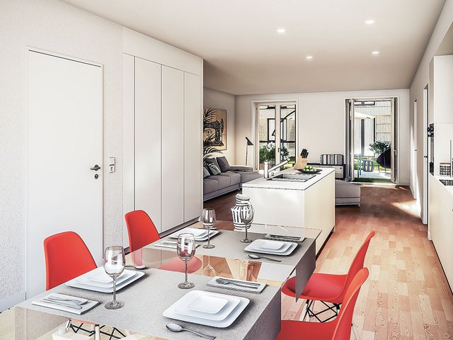 Spielwiese für Kinder vor einem der vierstöckigen Punkthäuser mit 2,5- und 3,5-Zimmer-Wohnungen.
